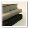 Sound absorbing acoustic foam for control of noise from machinery and acoustic enclosures
