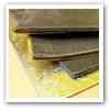 a pile of three dark grey dedsheet mats on top of galvanised steel deadsheet thumbnail 001 Others